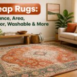 Colorful clearance rugs displayed on a wooden rack in a home goods store.
